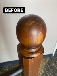 a picture of a wooden post with a ball on it